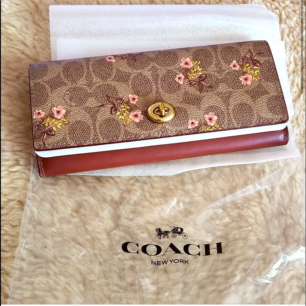 NWT & Packaging COACH FLORAL LG ENVELOPE WALLET